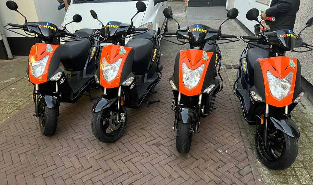 scooters in line